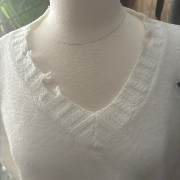 Unique Vintage White V-Neck Sweater with Black Crosses - Picture 3 of 8